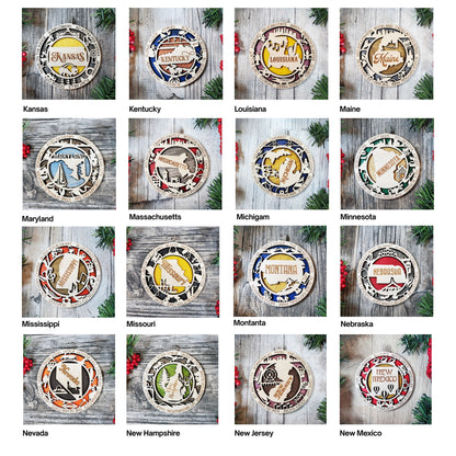 A grid of 16 oval-shaped wooden cribbage board tops, each labeled with a state name such as Kansas, Kentucky, Louisiana, and Minnesota. The tops are displayed on a rustic gray wood background with pine branches and red berries as decorative props.