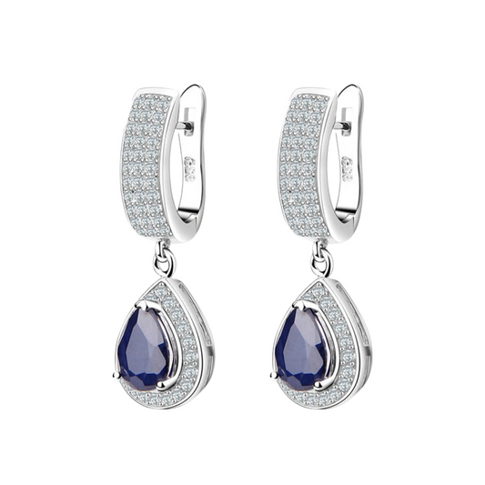 Natural Sapphire Drop Earrings.  Cubic Zirconia hinged back earrings with hanging blue sapphire set in 3 prong setting surrounded by cubic zirconia