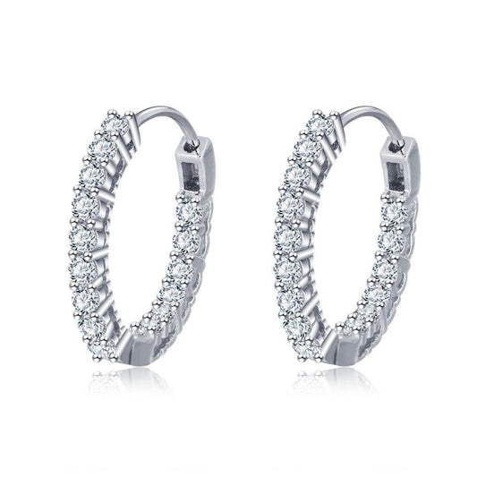 Shimmering Star Hoop Earrings with cubic zirconia on front side and on the inside of back side.