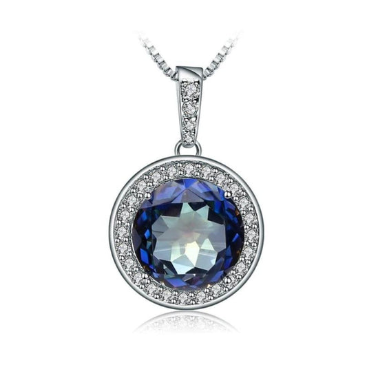 Natural Blue Mystic Quartz Gemstone Pendant Necklace. Blue Mystic Quartz stone is surrounded by cubic zirconia on a round shaped pendant. 