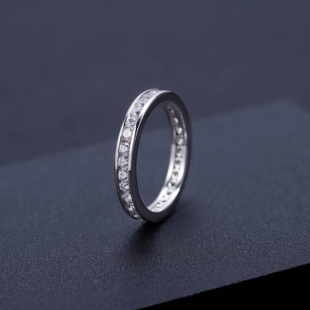 0.33Ct Moissanite Eternity 925 Sterling Silver Ring on black background