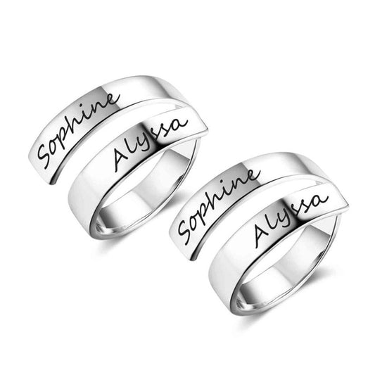 Personalized Engraved Name Silver Stainless Steel Adjustable Ring.  Ring is a spiral shape with two names parallel to each other.  "Sophine" and "Alyssa" are engraved on them.