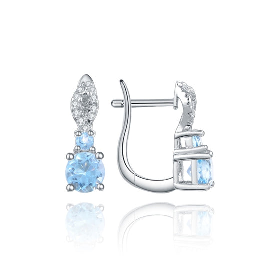 Front and side views of the 6mm Round Natural Sky Blue Topaz 925 Sterling Silver Earrings.  Two sky blue topaz stones, small one stacked on the larger one supported by 4 prong settings each.  Cubic Zirconia adorn the top of the earring.